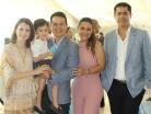 Hectór con sus papás y padrinos