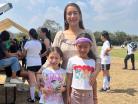 Luzma con sus hijas