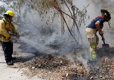 En semáforo rojo por incendios en la capital